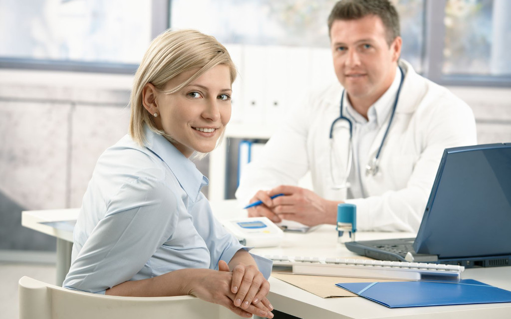 Smiling Patient and Doctor Consultation