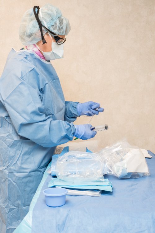 Vascular surgeon preparing for a surgery